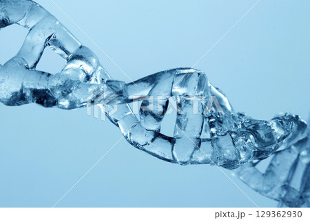 Icy DNA Helix. DNA Helix. Close-up of a transparent blue DNA helix 129362930