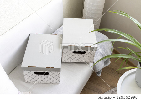 Close up shot of decorative carton box. Household items Close up shot of decorative carton box. Household items 129362998