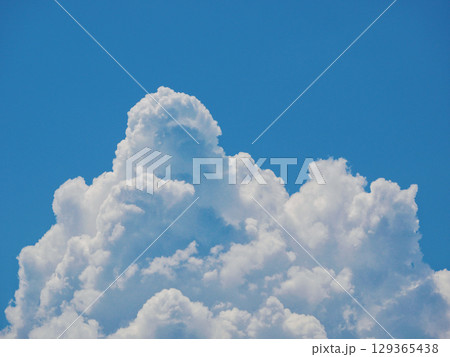 Cumulonimbus Cloud Formation Against Clear Blue Sky Cumulonimbus Cloud Formation Against Clear Blue Sky 129365438
