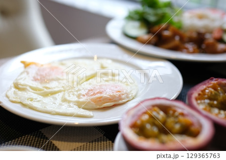 passion fruit Wafer with Fried Egg and Vegetable Sauce, Breakfast 129365763