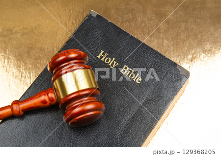 A finely crafted wooden gavel with a gold band A finely crafted wooden gavel with a gold band 129368205