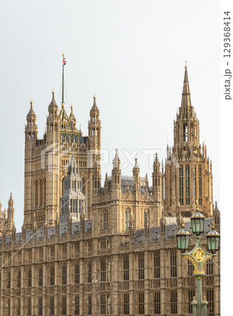 Palace of Westminster (the Houses of Parliament), its distinctive Gothic Revival architecture, characterized by intricate stonework and towering spires. 129368414
