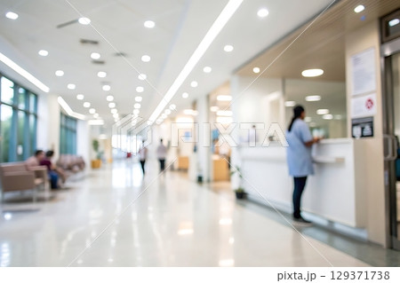 Bright Modern Healthcare Reception Area with Staff and Visitors Engaged in Activities Bright Modern Healthcare Reception Area with Staff and Visitors Engaged in Activities 129371738