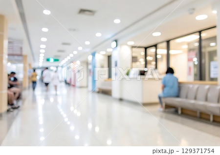 Blurry Hospital Corridor with Waiting Area and Soft Lighting in Modern Healthcare Facility 129371754