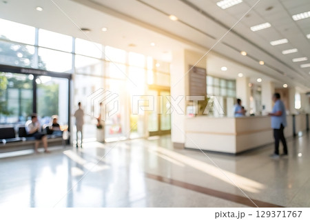 Bright and Modern Lobby Interior with Natural Light and Reception Area in Urban Setting 129371767