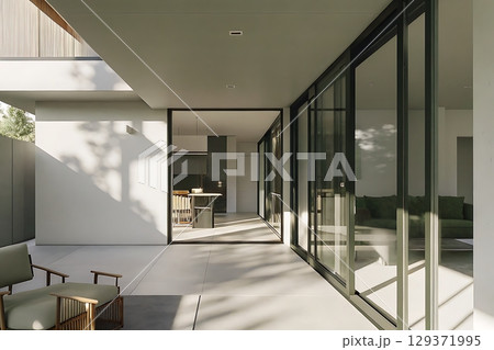 Modern Minimalist Architecture with Glass Walls Showcasing Indoor-Outdoor Living Spaces Modern Minimalist Architecture with Glass Walls Showcasing Indoor-Outdoor Living Spaces 129371995