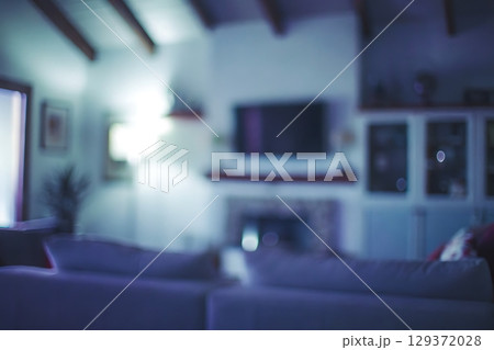 Soft Focus Interior Living Room with Comfortable Couch and Modern Decor in Bright Atmosphere 129372028
