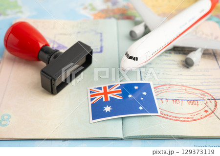 Australia flag and passport with airplane for travel. 129373119