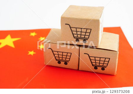 Online shopping, Shopping cart box on Canada flag, import export, finance commerce. Online shopping, Shopping cart box on Canada flag, import export, finance commerce. 129373208