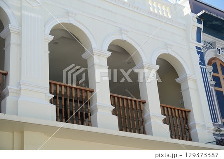 Detailed view of windows, doors and balconies of city buildings Detailed view of windows, doors and balconies of city buildings 129373387