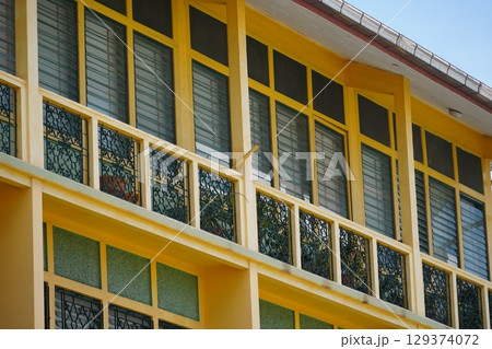 Detailed view of windows, doors and balconies of city buildings Detailed view of windows, doors and balconies of city buildings 129374072
