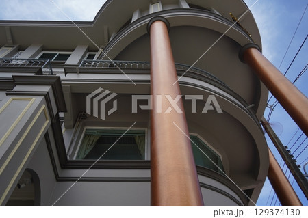 Detailed view of windows, doors and balconies of city buildings Detailed view of windows, doors and balconies of city buildings 129374130