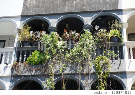 Detailed view of windows, doors and balconies of city buildings Detailed view of windows, doors and balconies of city buildings 129374815