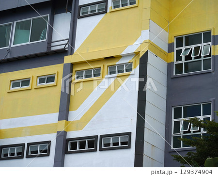 Detailed view of windows, doors and balconies of city buildings Detailed view of windows, doors and balconies of city buildings 129374904
