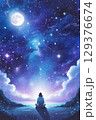 満月と星空の下で静かな時間を過ごす人 129376674