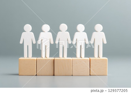 Business Concept Representing Personnel Management with Wooden Blocks and Figurines 129377205