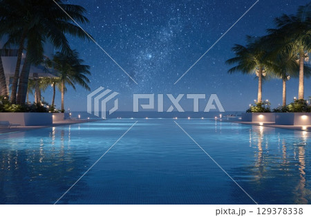 an infinity pool overlooking the ocean at night, with palm trees and lights 129378338