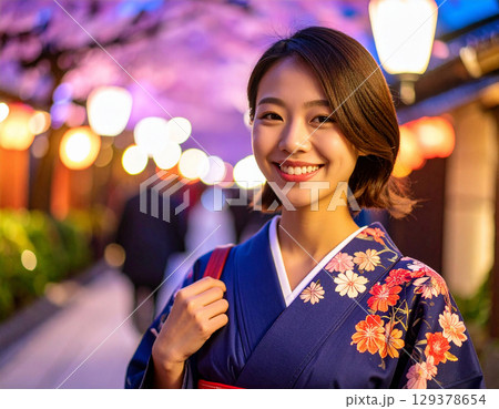 お祭りに来た若い女性/ Young woman at the festival	 129378654