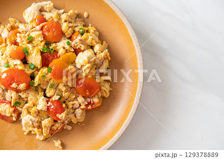 stir-fried tomatoes with egg on plate stir-fried tomatoes with egg on plate 129378889