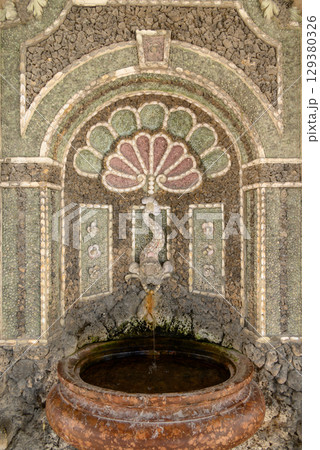 Shell Fountain in the Diana Temple in Hofgarten garden next to the Residenz palace in central Munich, Bavaria, Germany 129380326