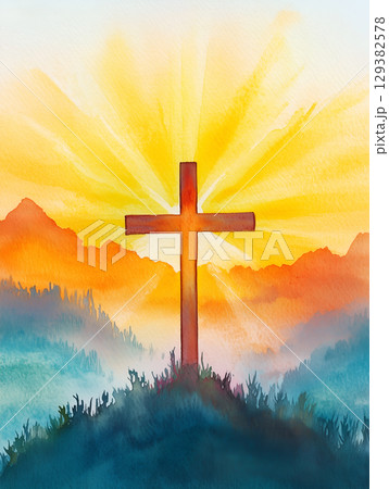 The crucifix symbol stands tall against a breathtaking mountain sunset background The crucifix symbol stands tall against a breathtaking mountain sunset background 129382578