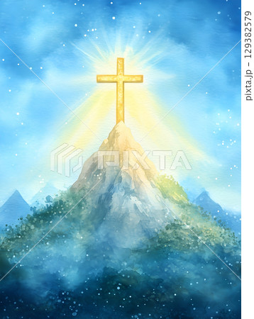 Crucifix illuminated by sunset glow atop a mountain surrounded by serene landscape Crucifix illuminated by sunset glow atop a mountain surrounded by serene landscape 129382579