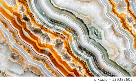 Stunning jasper stone texture showcasing vibrant orange and cream hues with swirling patterns 129382605