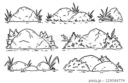 A set of different stones in the grass 129384774