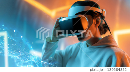 Woman with VR virtual reality goggles 129384832