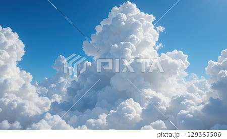 Bright White Clouds Against a Clear Blue Sky Creating a Serene and Tranquil Atmosphere for Nature Lovers Bright White Clouds Against a Clear Blue Sky Creating a Serene and Tranquil Atmosphere for Nature Lovers 129385506