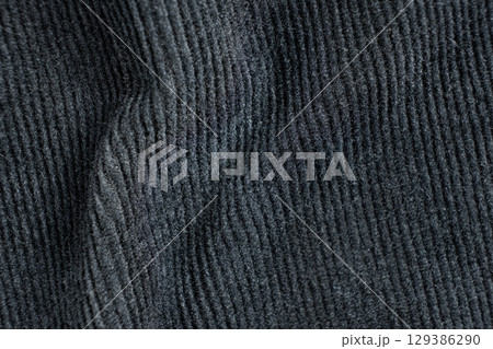Macro Texture of Black Corduroy Fabric with Cotton and Elastane Blend 129386290