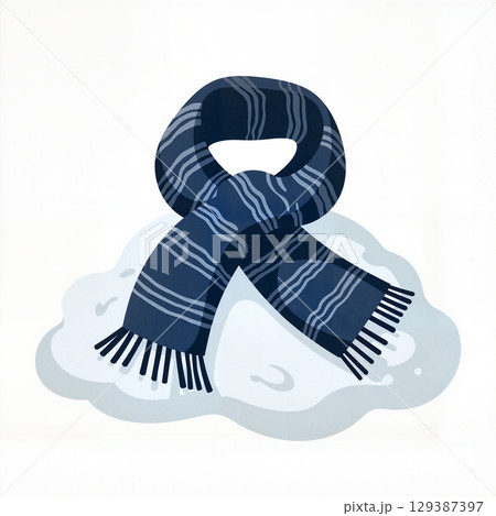 Cozy wool scarf resting on fresh snow, winter warmth 129387397