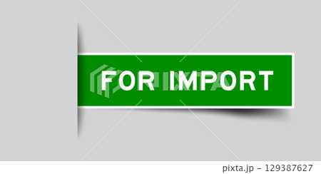 Green color square shape sticker label with word for import inserted in gray background 129387627