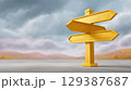 Crossroads sign displays multiple arrows indicating various directions in soft foggy background. Concept of decision making, uncertainty, life choices. 129387687