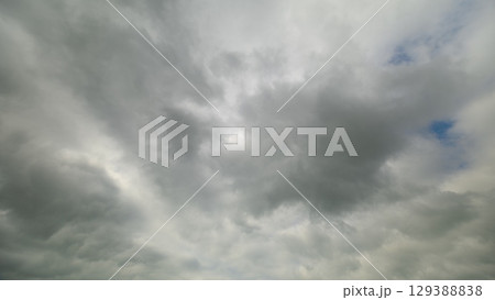 A stunning dynamic cloudscape is beautifully captured in motion, showcasing its ethereal beauty A stunning dynamic cloudscape is beautifully captured in motion, showcasing its ethereal beauty 129388838