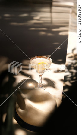 Fruit cocktail in a bar, cocktail glass Summer vacation. vodka sour. 129388917