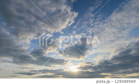 Dramatic Sky with Clouds at Sunset, showcasing breathtaking beauty and vivid colors 129389569