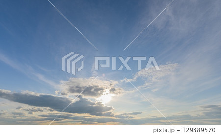 Experience the Serene Sky A Stunning Display of Beautiful Clouds and Sunlight that Captivates 129389570