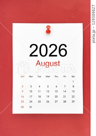 August 2026 calendar page with push pin on red color background. August 2026 calendar page with push pin on red color background. 129389827