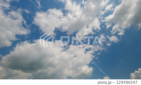 The Beautiful Cloudy Sky featuring an Elegant Blue Background that captivates the viewers eye 129390247