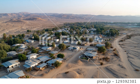 Urban city surrounded by dry, desertified land. Water crisis and water shortages in summer during prolonged drought. 129392381