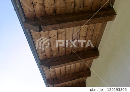 the pitch of a roof with wooden beams the pitch of a roof with wooden beams 129393806