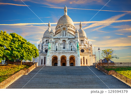Basilica of the Sacred Heart in Montmartre, Paris, beautiful front sunset view 129394379