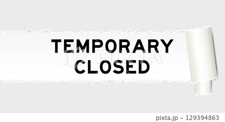 Ripped gray paper background that have word temporary closed under torn part Ripped gray paper background that have word temporary closed under torn part 129394863