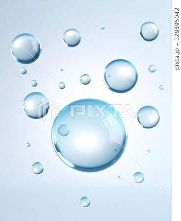 白い背景に、空中で静止する完璧な球形の水滴 129395042