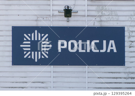Poland, Krakow, police sign on the police station along the Vistula River Poland, Krakow, police sign on the police station along the Vistula River 129395264