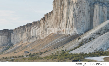 White rock Ak-Kaya in Crimea near Belogorsk illuminating by setting sun White rock Ak-Kaya in Crimea near Belogorsk illuminating by setting sun 129395267