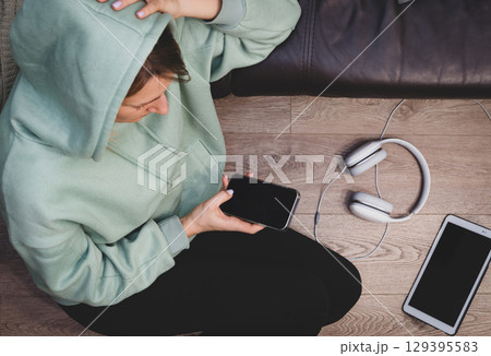 woman lying on the floor woman lying on the floor 129395583