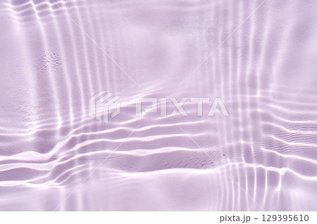 Abstract purple water background with streaks of water. 129395610