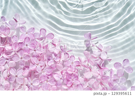 Abstract background with water and flowers. Space for the text. Abstract background with water and flowers. Space for the text. 129395611